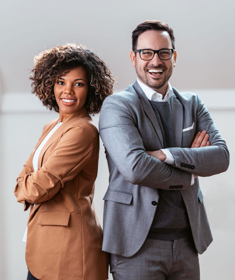 Two senior Vader Barclay consultants photographed together in the firm's offices