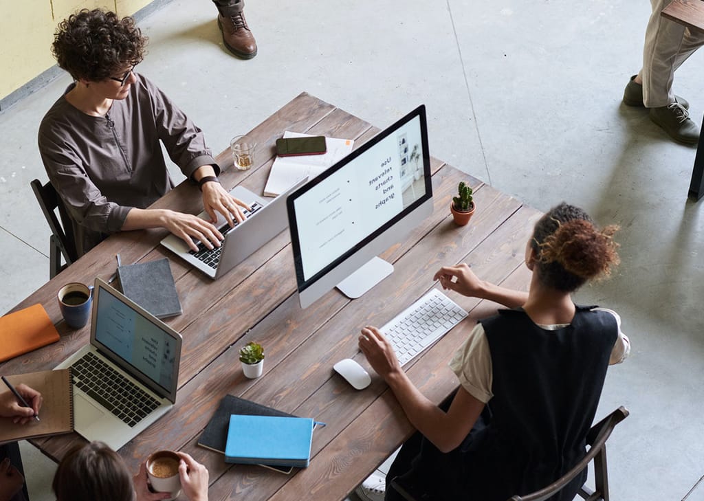 A consulting team working collaboratively through operational data