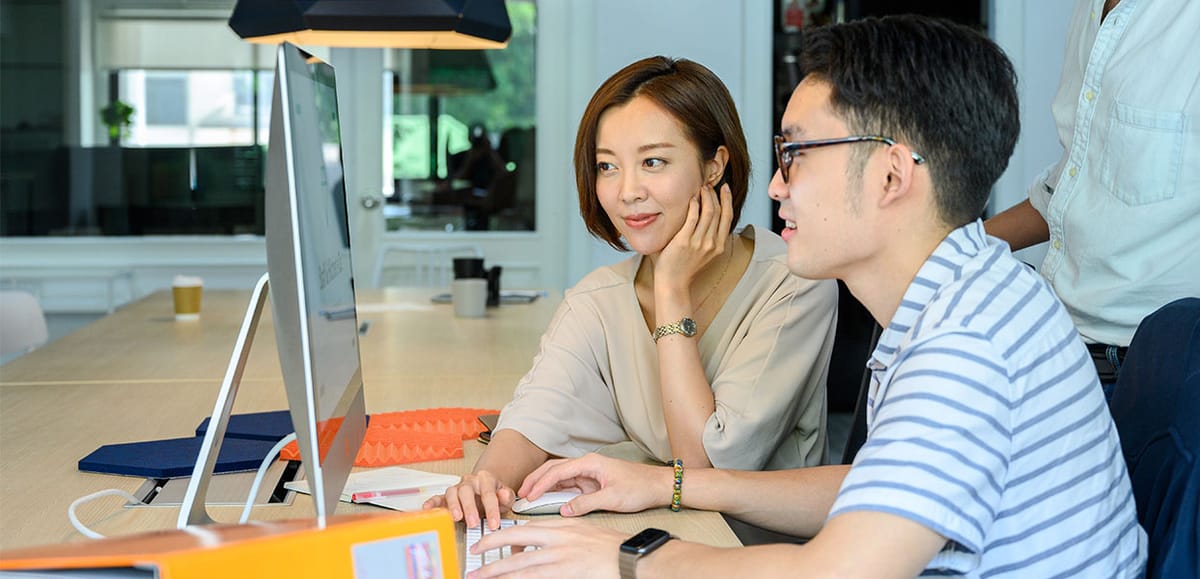 A marketing and commercial team working through positioning in a strategy session